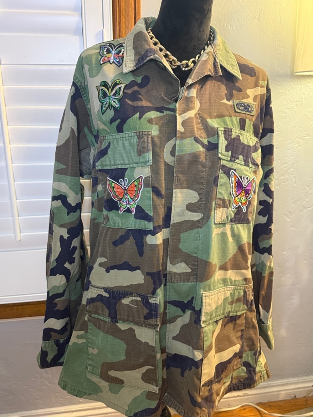 Camo Utility Jacket with Colorful Butterfly Patches